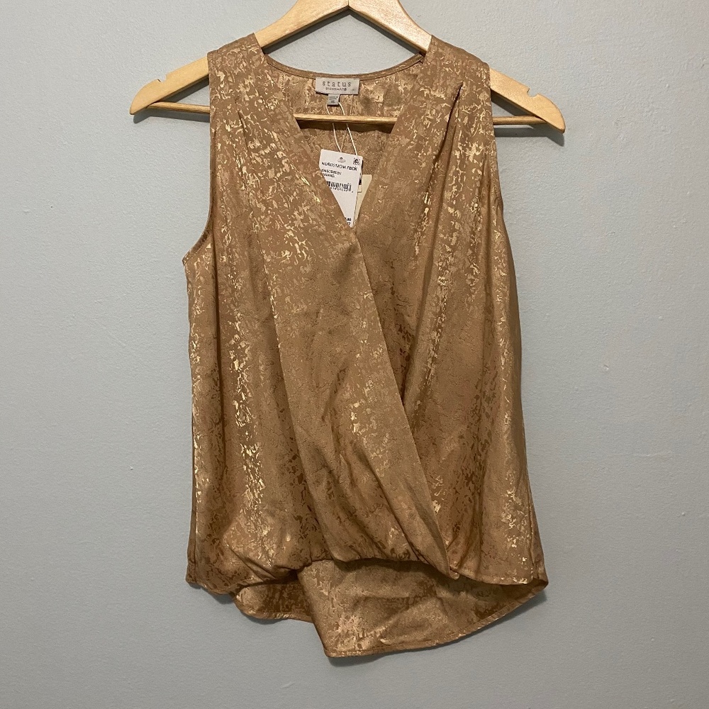 Gold shimmer sleeveless blouse